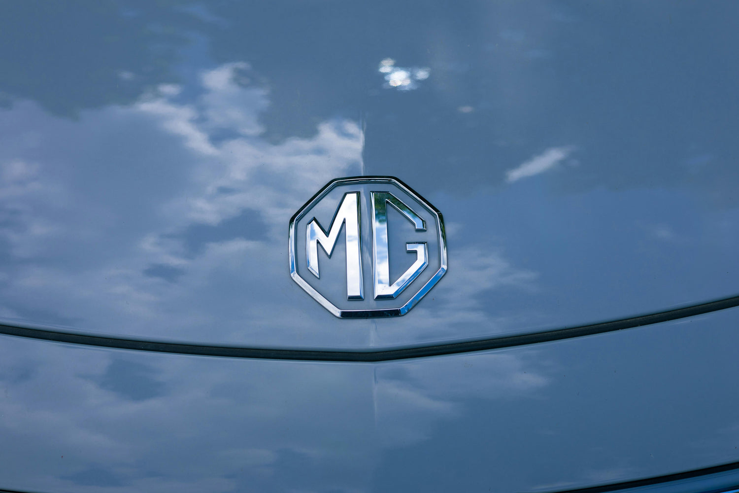 MG